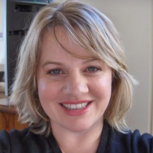 Vision Australia Director Older Australians Strategy Michelle Eunson is smiling at the camera. She has short blonde hair
