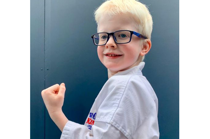 Sam wearing his karate gear