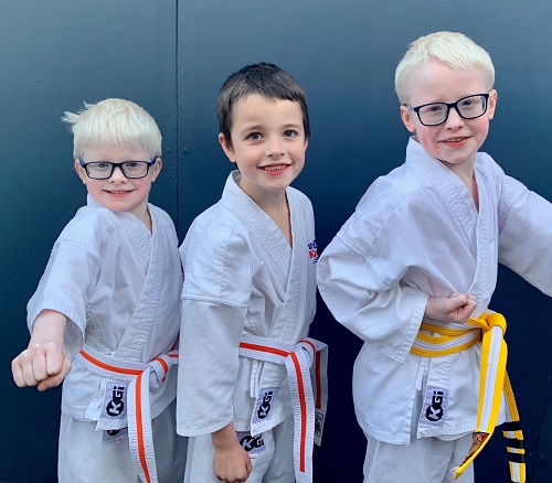 The three Bradley boys in their Karate whites