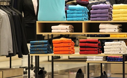 Image shows a display of men's clothes in a store