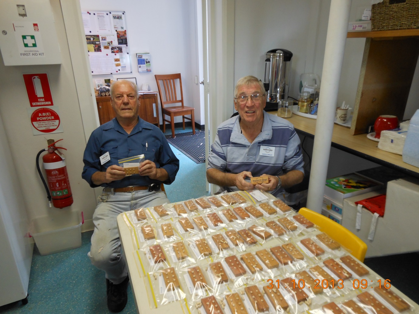 making braille blocks Norm Shopland and Harold Pedley from Harry's Shed with the braille boards