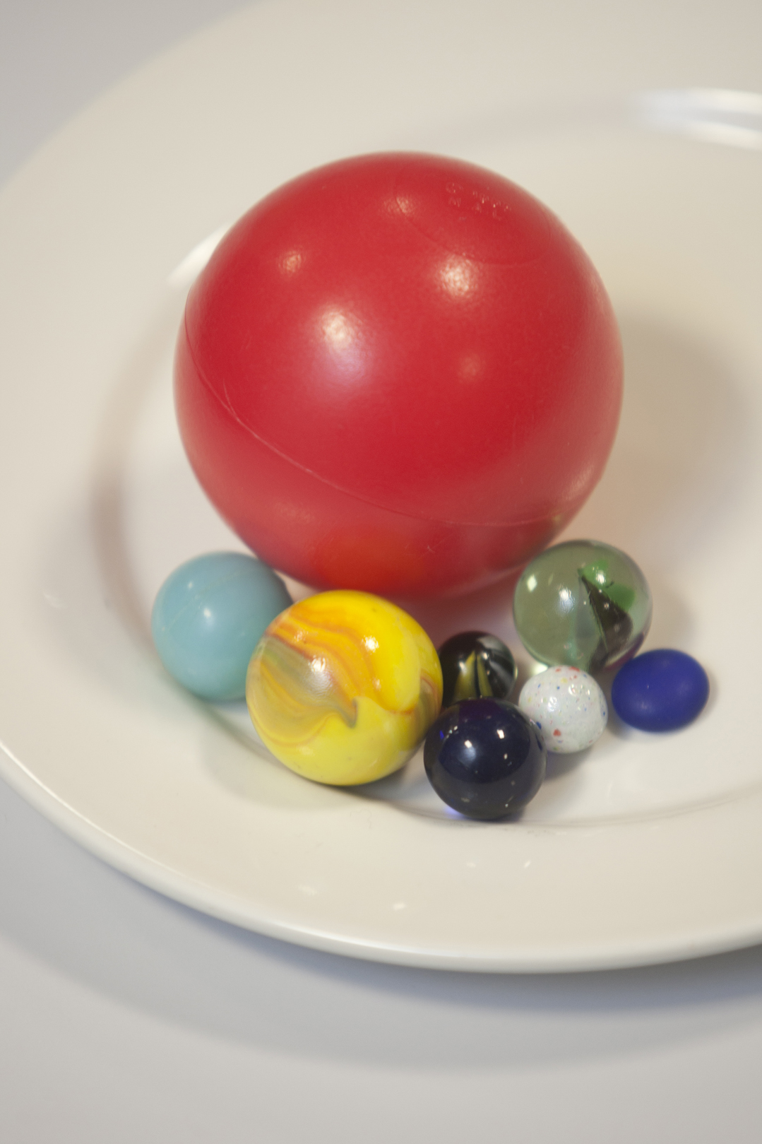 Different coloured and sized balls used for vision tests
