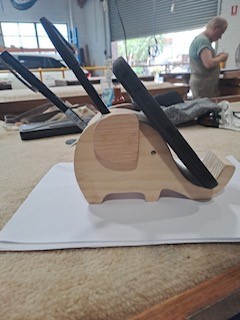 Wooden elephant pen holder built at workshop