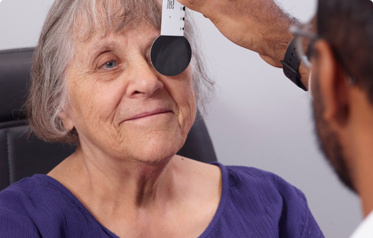 Woman has an eye examination with an optometrist