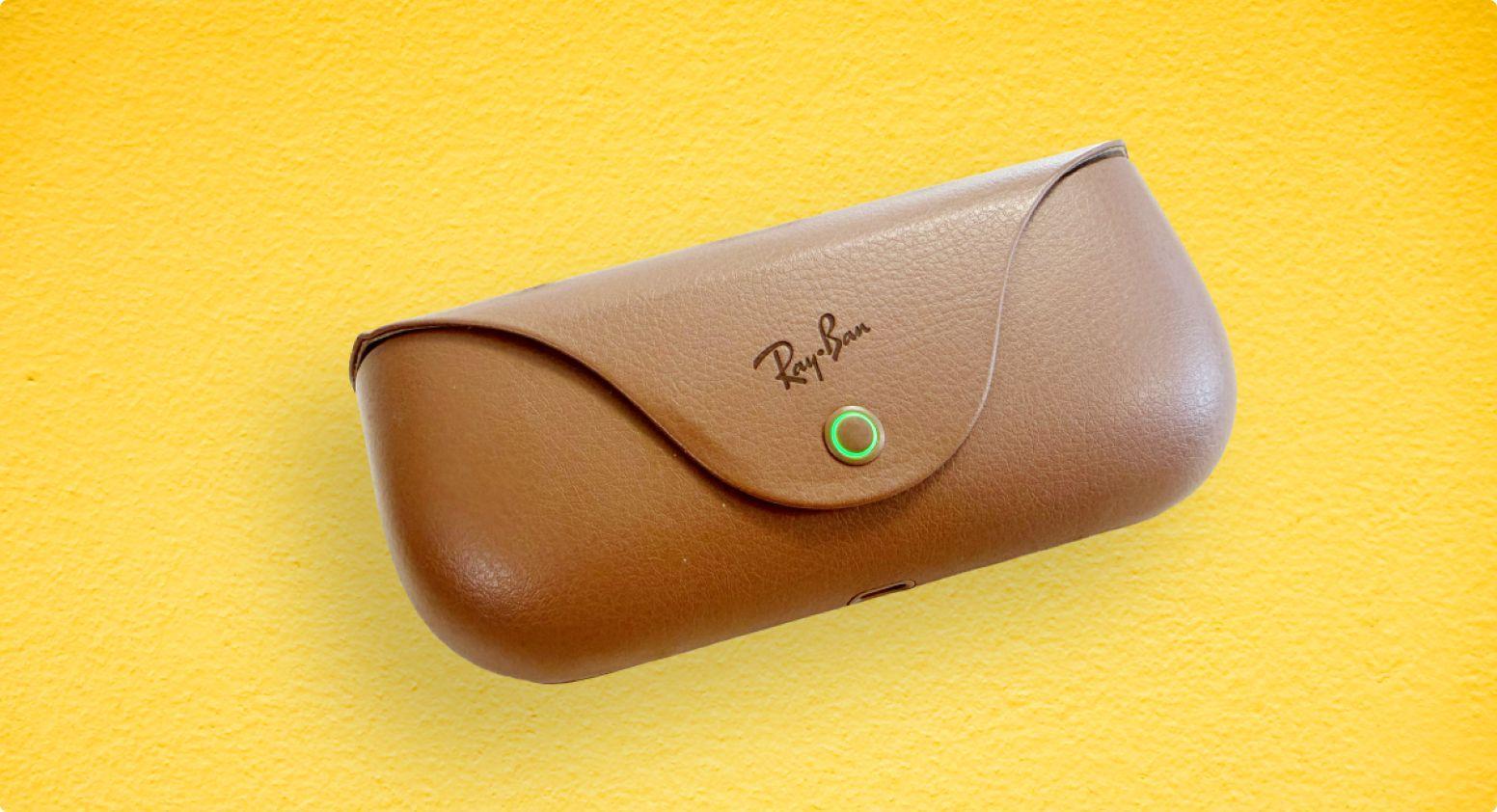 A closed charging case with the Ray-Ban Meta glasses inside