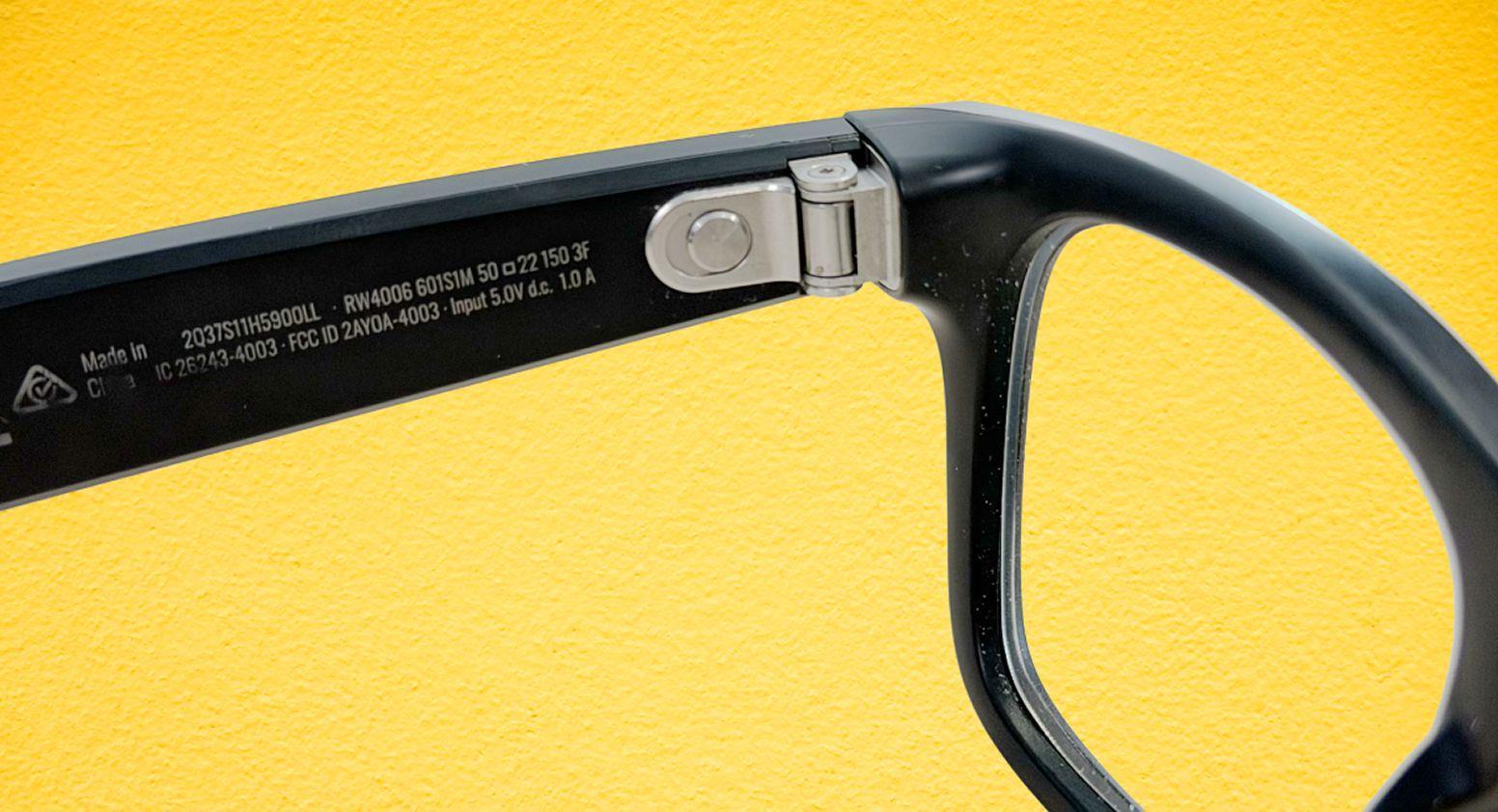 Left inside temple of the Ray-Ban Meta glasses where a circular power switch is located.